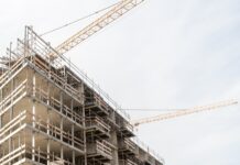 Optimism grows for AI in construction despite adoption challenges Construction. Image credit: Mike van Schoonderwalt | AI PropTech News