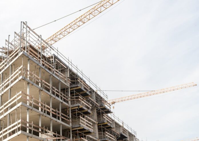 Construction. Image credit: Mike van Schoonderwalt | AI PropTech News
